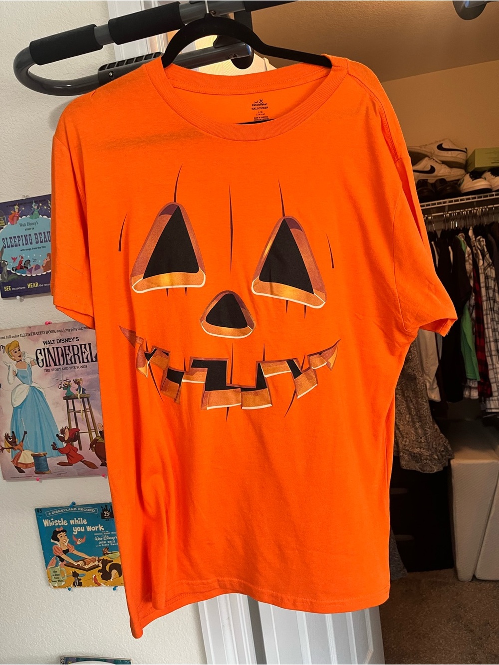 Orange Halloween pumpkin face graphic tee